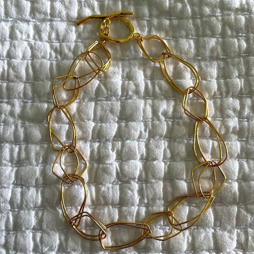 Gold necklace.